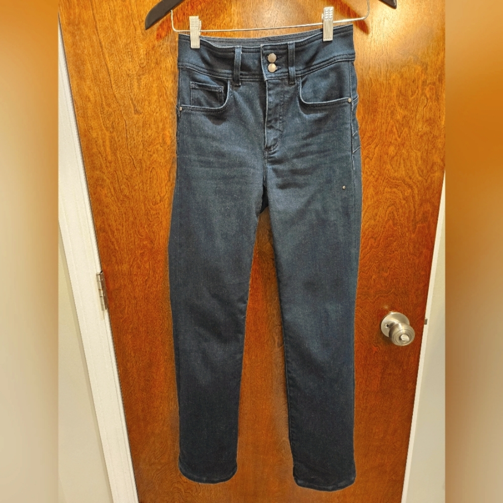 Dark rinse, high-waisted, boot cut Guess jeans